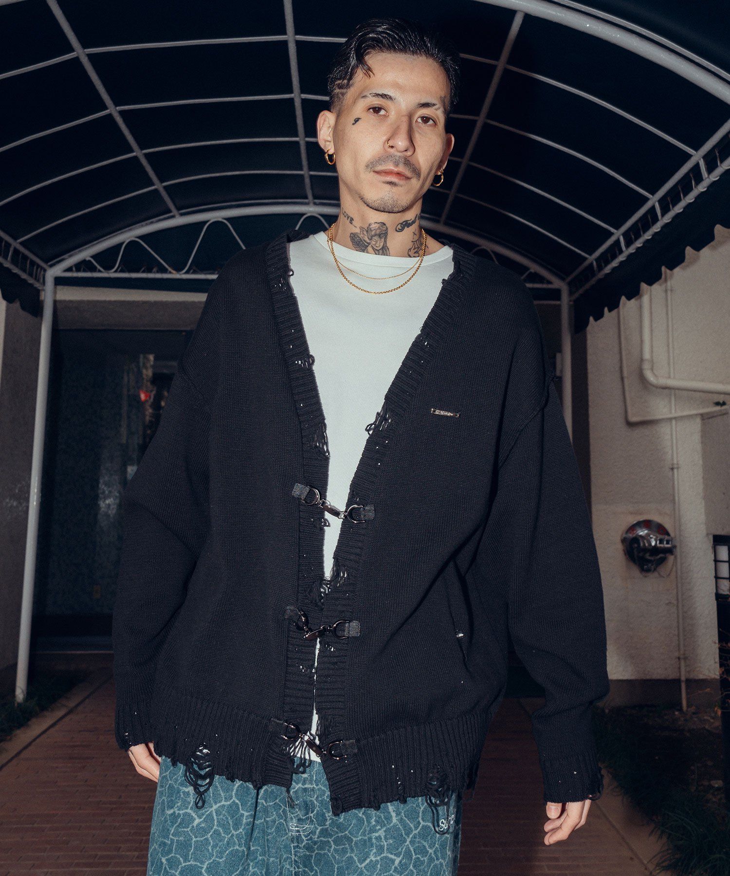 Damaged knit cardigan