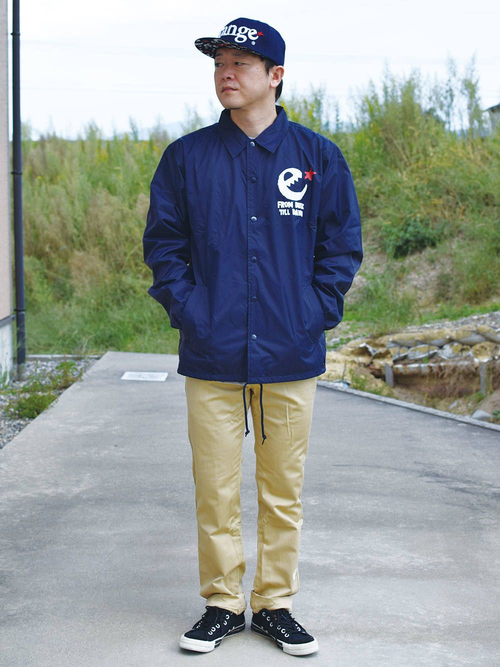 rg hand writing logo coahes jkt