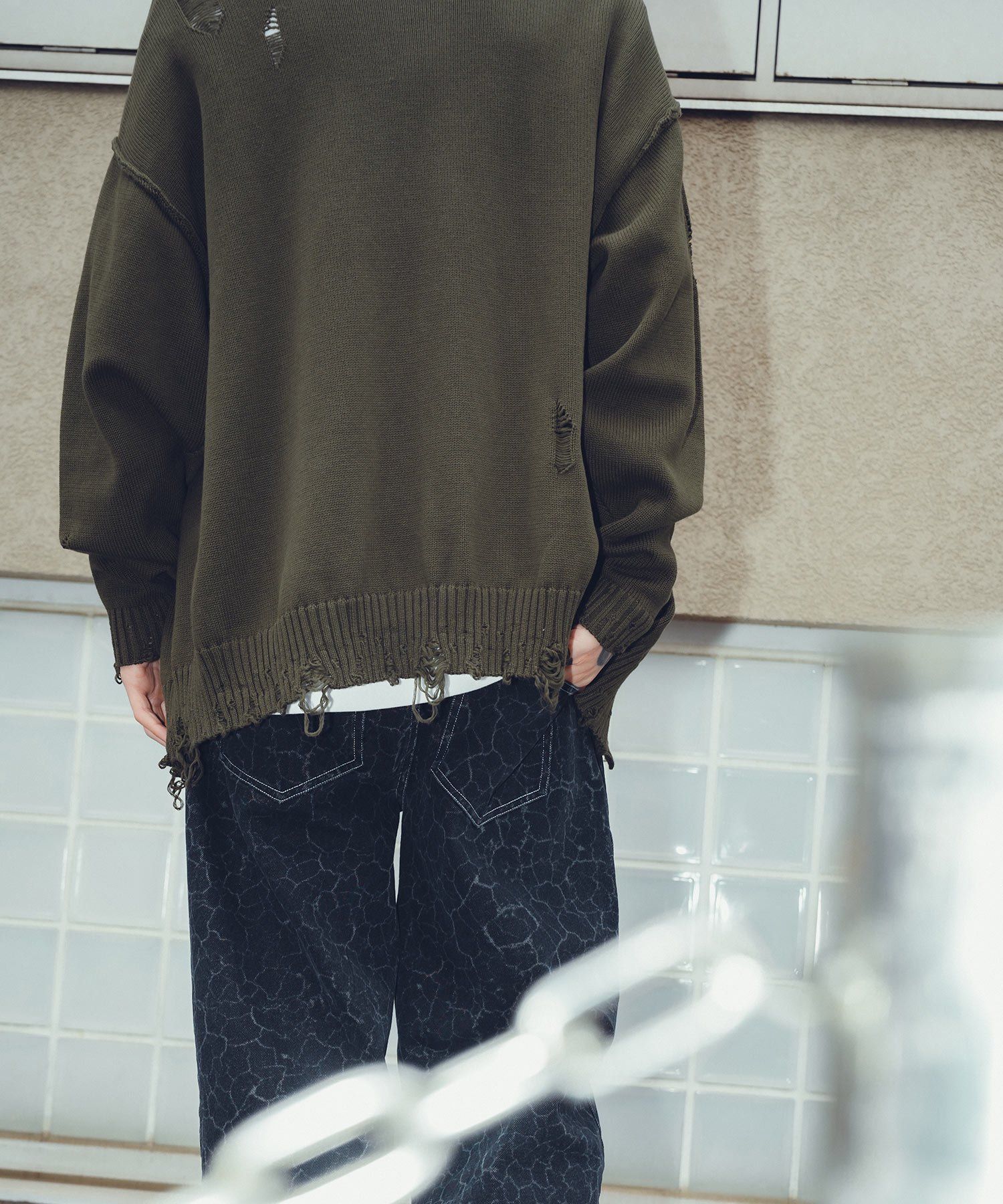 Damaged knit cardigan