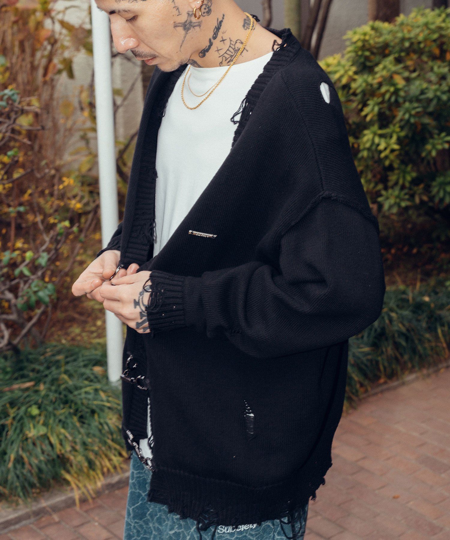 Damaged knit cardigan