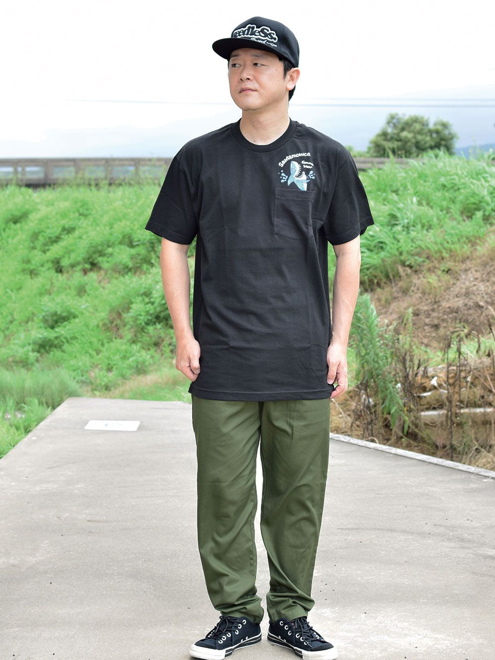 shark out of pocket tee