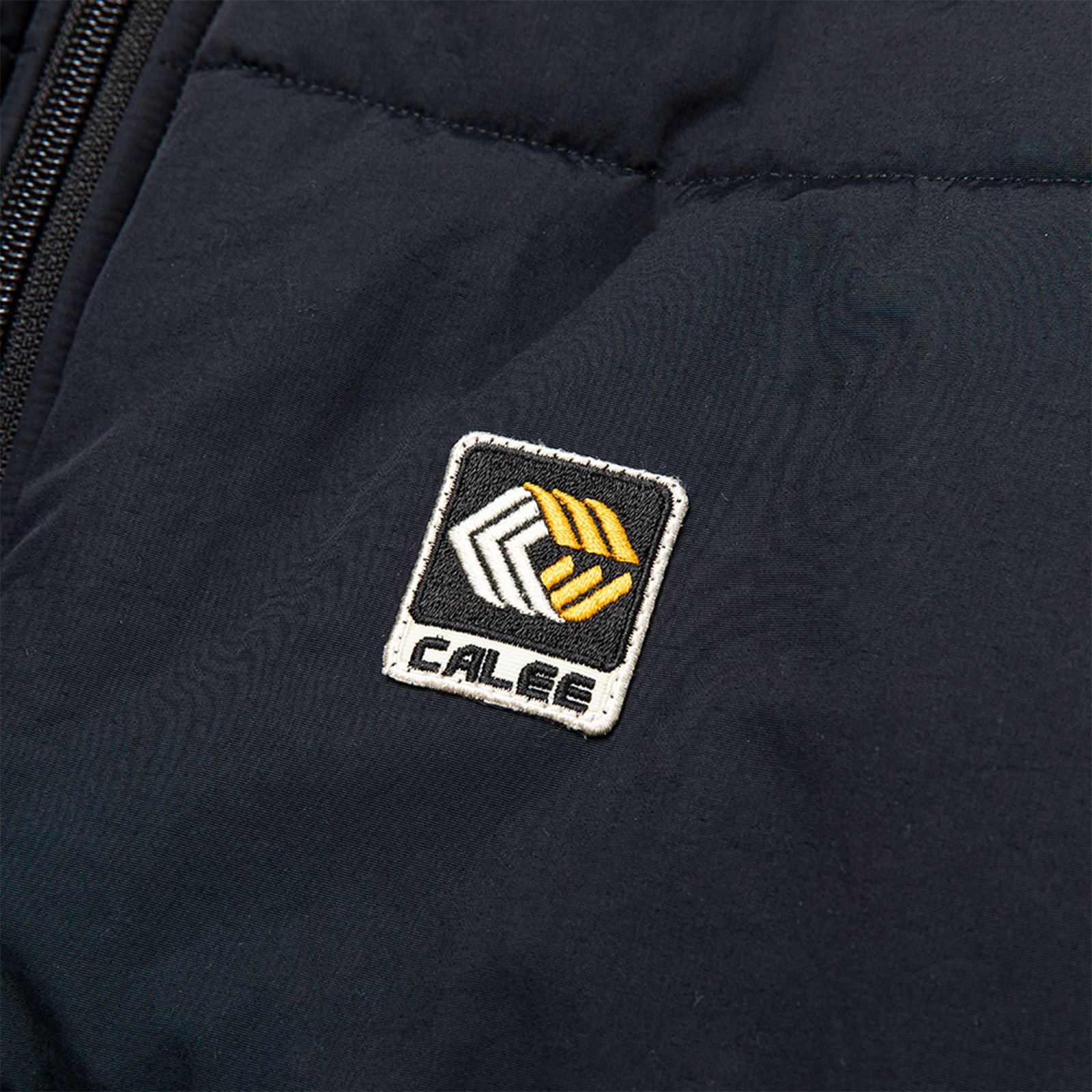 CALEE - 【ラスト1点 XL】Retroreflector padded jacket / ブラック | Filo