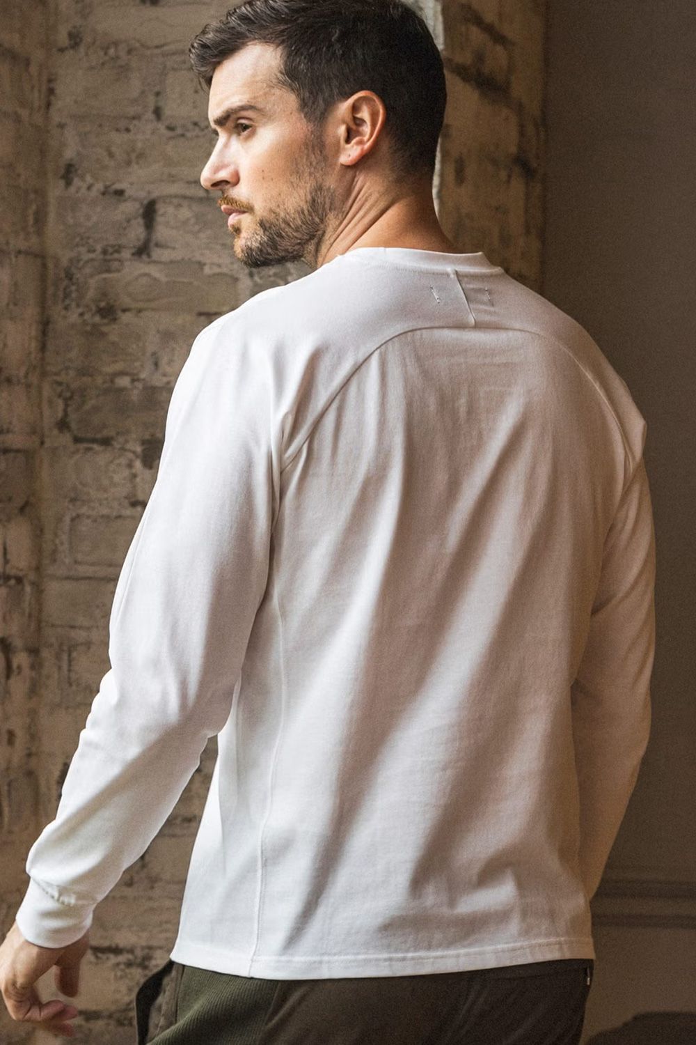 【26AW】 SCRIPT LOGO HOTFIX STUDS L/S T-SHIRT / スクリプトロゴ ホットフィックス スタッズ ロングスリーブ Tシャツ (ホワイト)