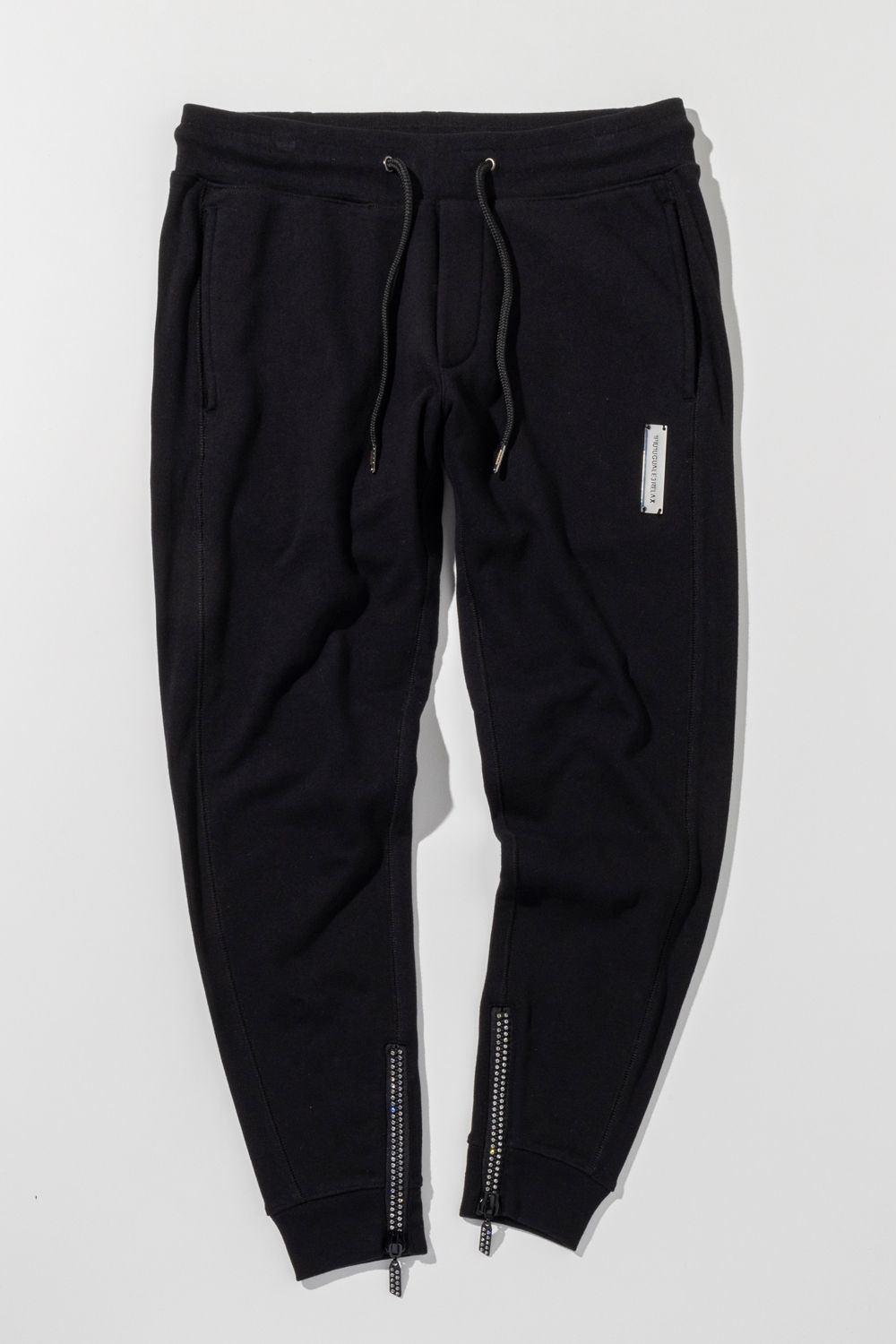 GLITTER ZIP + PLATE JOGGER PANTS / シルバーロゴプレートスウェットロングパンツ (ブラック) (9月中旬入荷予定)