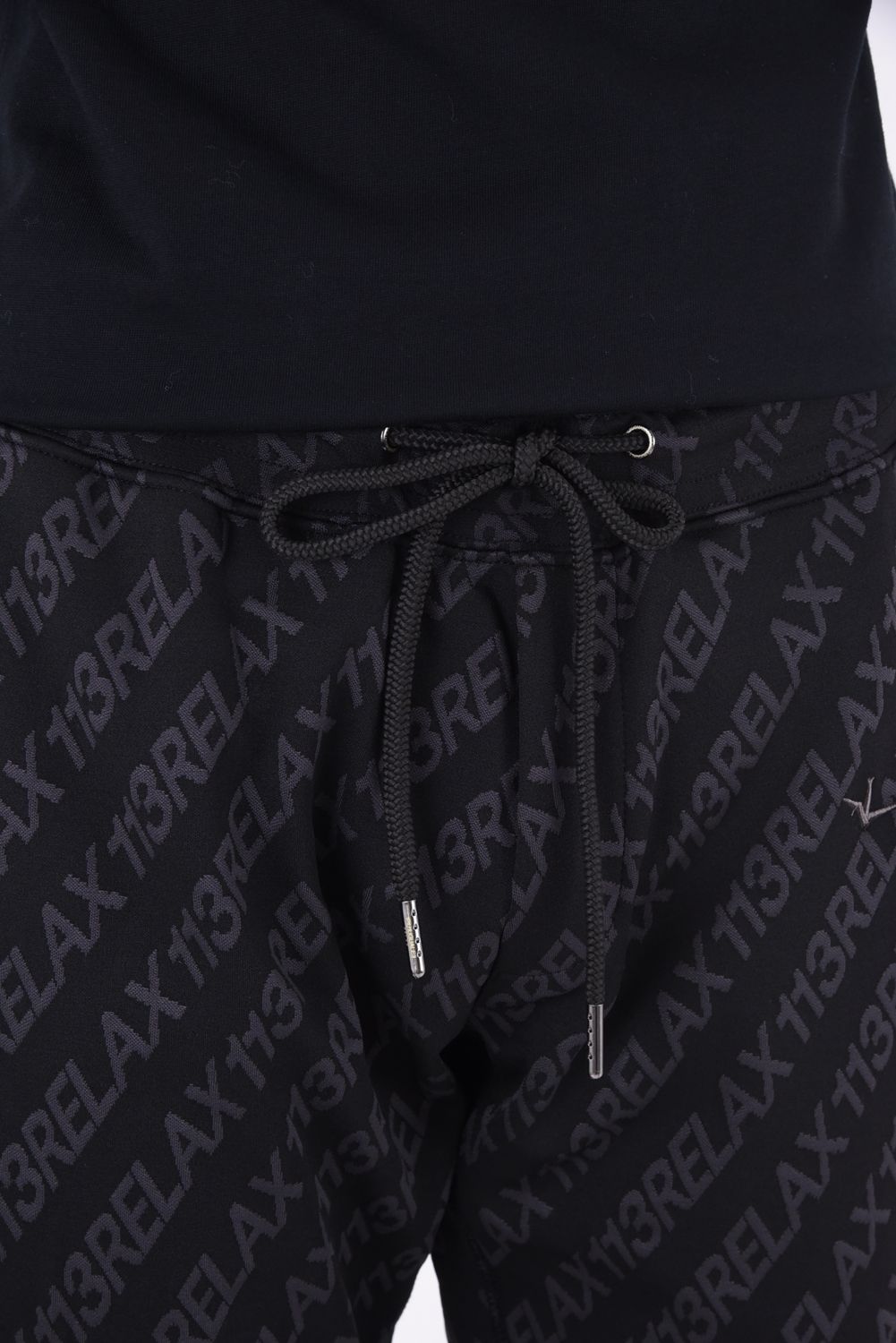 1PIU JACQUARD JOG PANTS / 総柄 ロゴジャガード パンツ ブラック