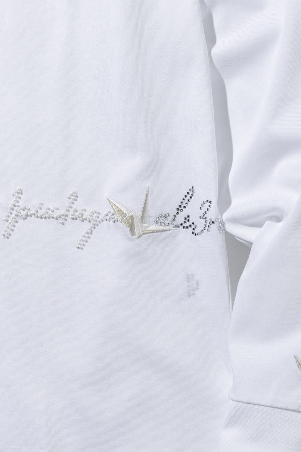 【26AW】 JEWELRY LOGO MERCERIZED LONG-SLEEVE T-SHIRT / ジュエリーロゴ マーセライズド ロングスリーブ Tシャツ (ホワイト) (10月上旬入荷予定)