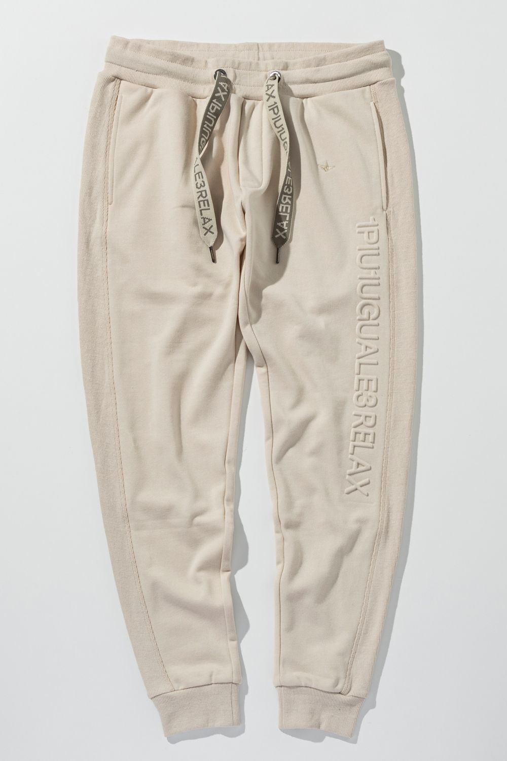 【26SS】 EMBOSSED LOGO JOGGER PANTS / エンボスロゴ ジョガーパンツ (ベージュ) (2月上旬入荷予定)
