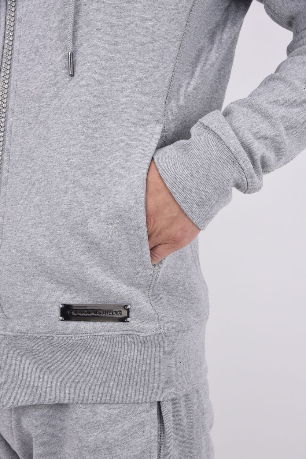 【25AW】 GLITTER ZIP + PLATE HOODIE / シルバーロゴプレートスウェットパーカー (グレー)