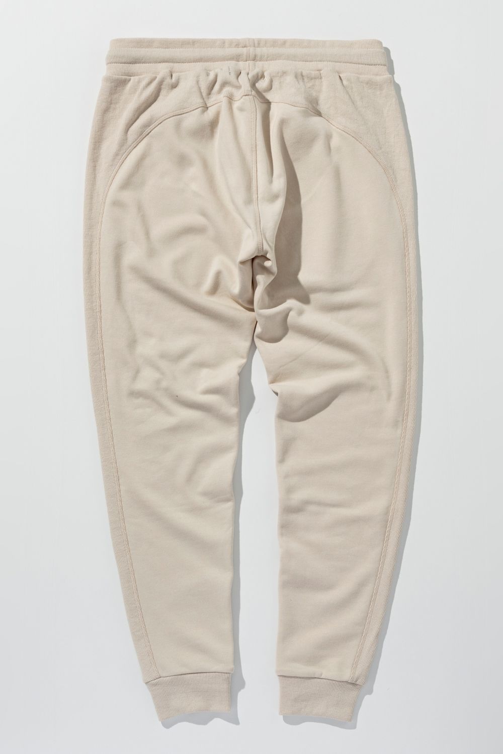 【26SS】 EMBOSSED LOGO JOGGER PANTS / エンボスロゴ ジョガーパンツ (ベージュ) (2月上旬入荷予定)