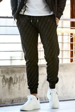 1PIU JACQUARD JOG PANTS / 総柄 ロゴジャガード パンツ ブラック