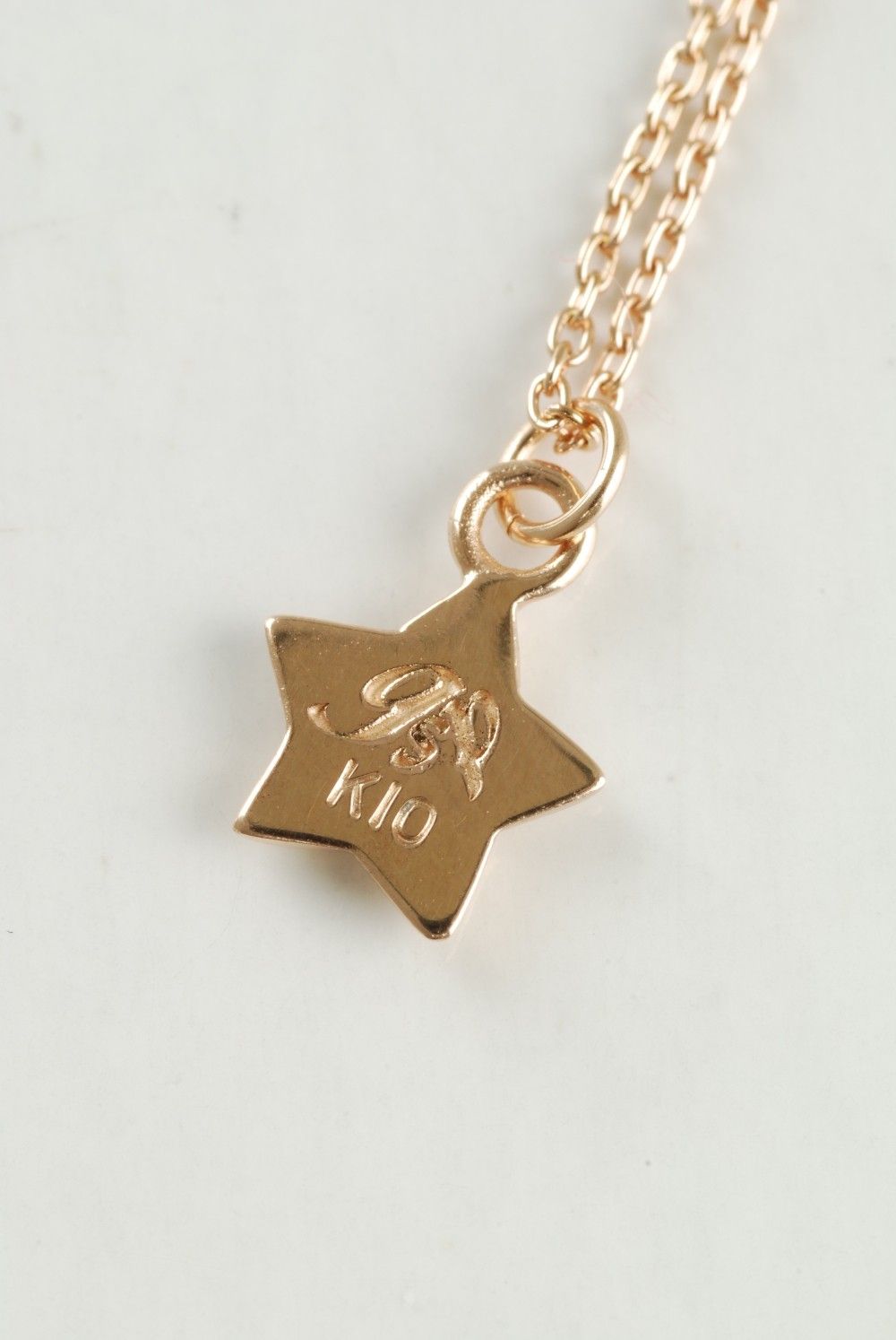 『10Krosegold w/Dia starlet necklace』