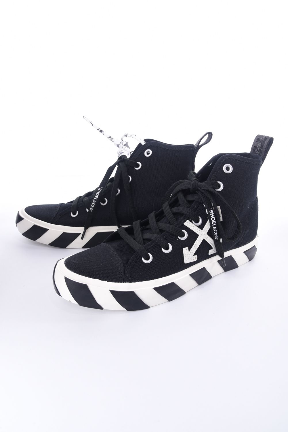 mid top vulcanized canvas white black