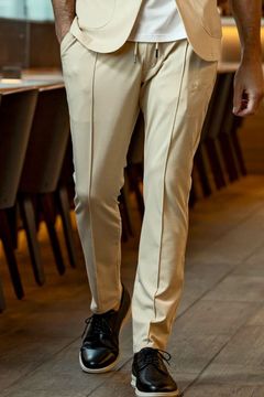 CUT AND SEW SLACKS / アーチロゴ カットソー スラックス ベージュ