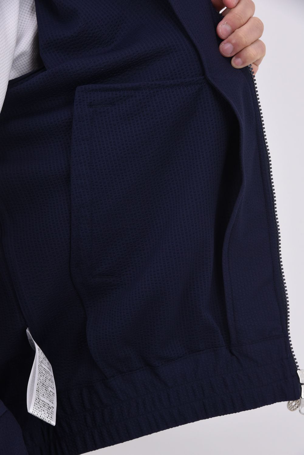 【26SS】 HIGH TENSION SUCKER STAND / シアサッカー サイドロゴ スタンドカラーブルゾン (ネイビー)