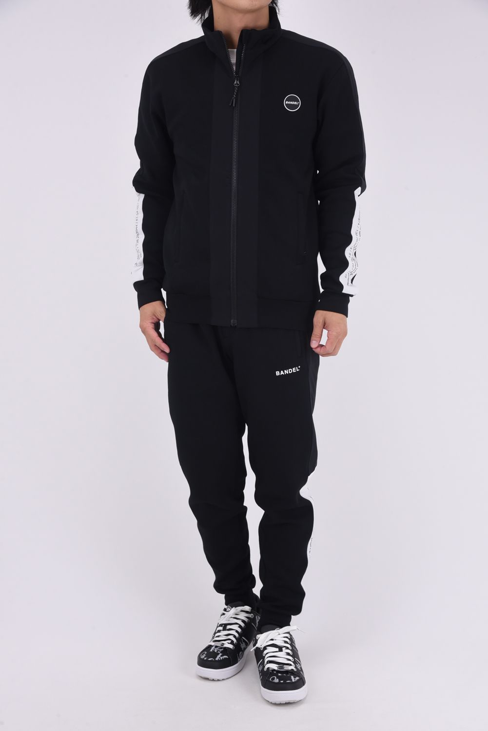 【25AW】 SIDE THICK LINE SWITCH LIB PANTS / ボンディング素材 コンセプトノーツプリント リブロングパンツ (ブラック)