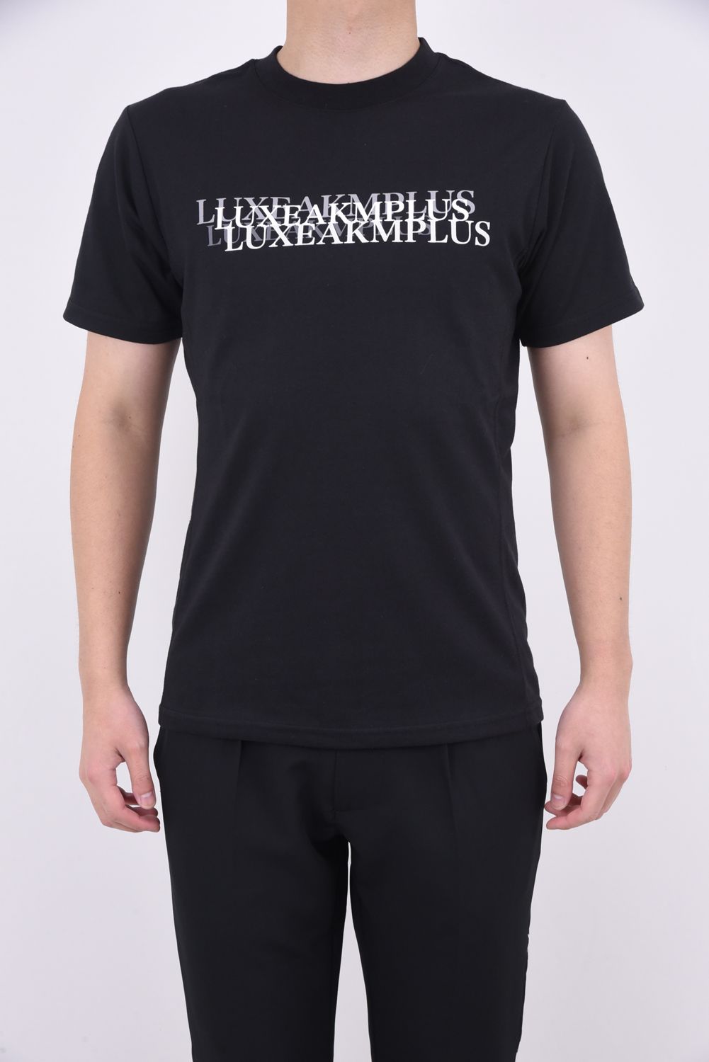 CONTINUOUS PATTERN T-SHIRTS / コンティニュアス ロゴ 半袖Tシャツ ブラック