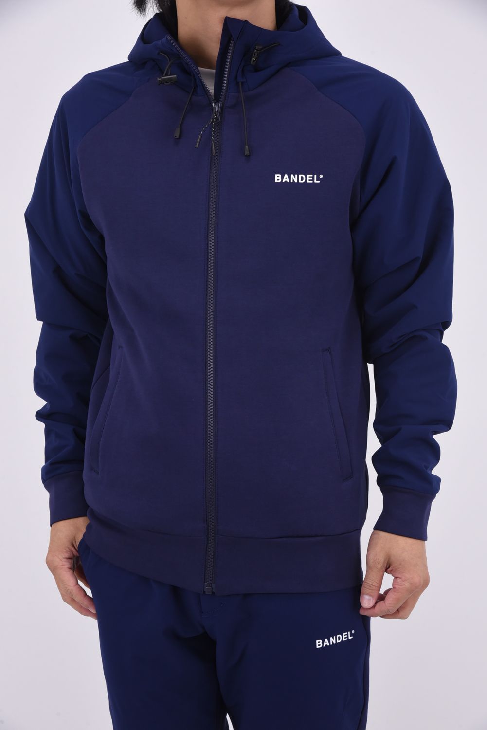 【25AW】 SWITCH RAGLAN SLEEVE ZIP HOODIE / ボンディング素材 ラグランスリーブ ハイネックジップフーディー (ネイビー)