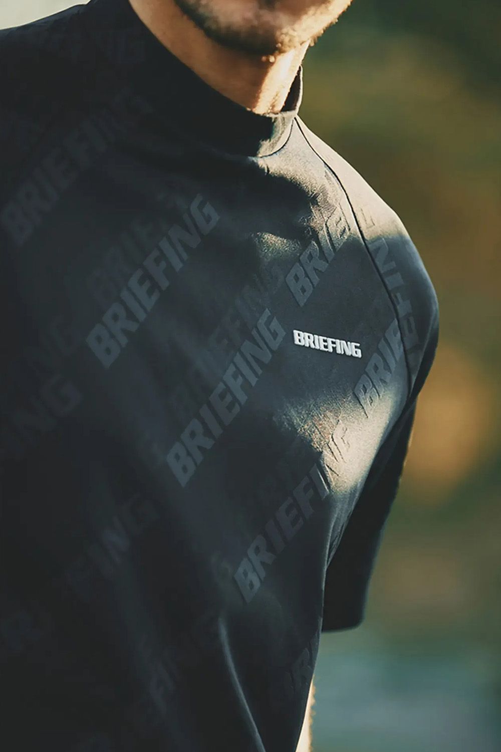 【26SS】 MEN'S SHADOW LOGO JQ HIGHNECK RF / バイアスロゴジャカード リラックスフィット モックネックTシャツ (ブラック)