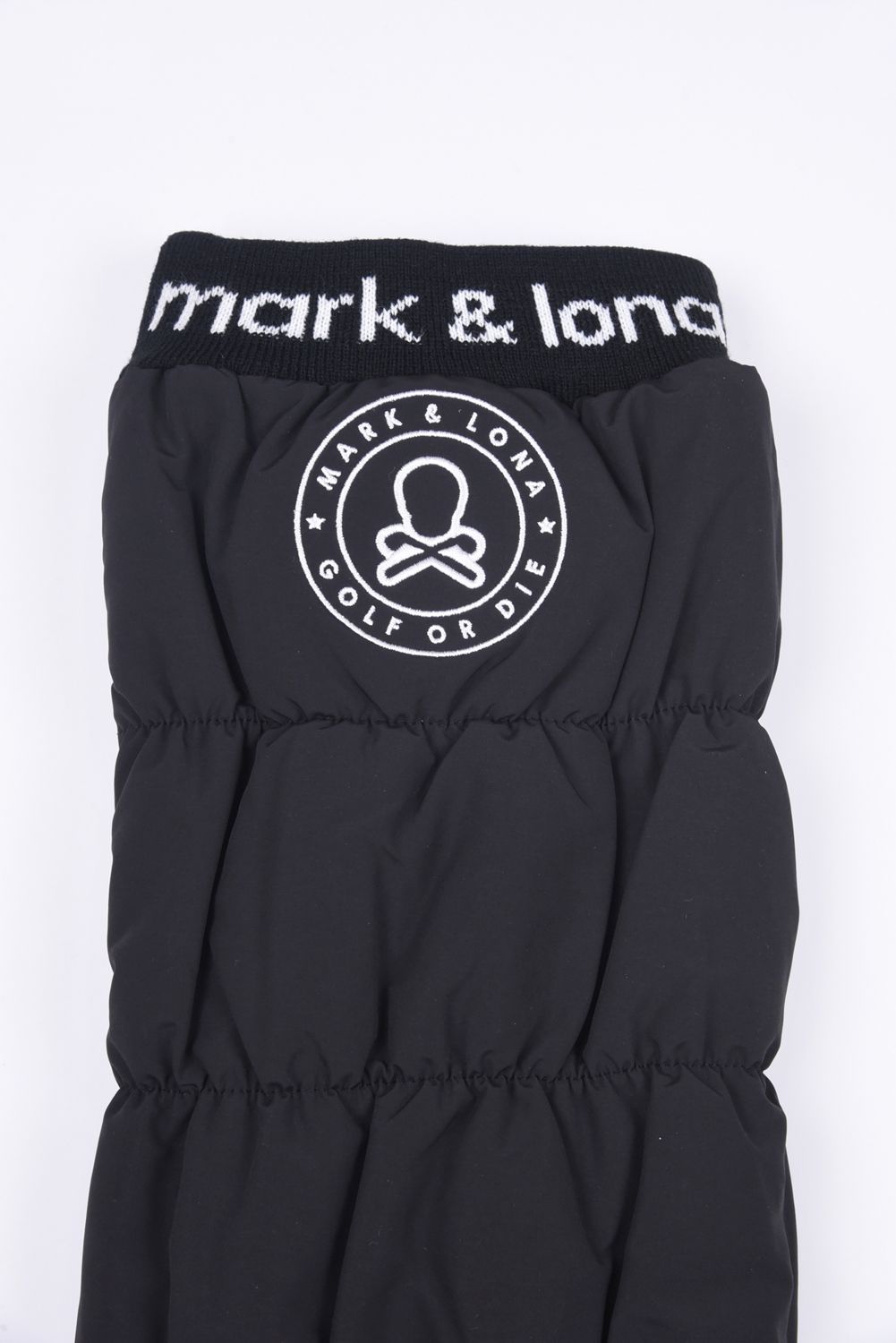 NODE PUFFY ZIP ON LEG WARMERS / サークルスカル刺繍 裏ボア レッグウォーマー (ブラック)