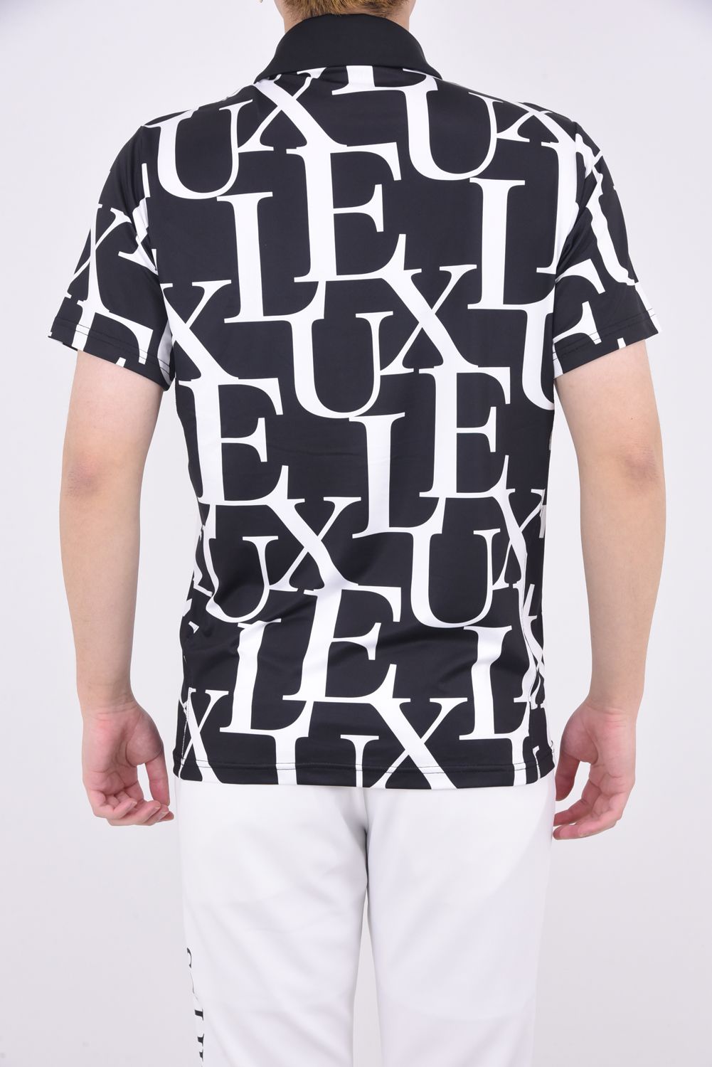 LUXE PATTERN POLO SHIRTS / 総柄ロゴ 半袖ポロシャツ (ブラック)