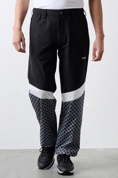 【25AW】 SWITCH DROST WIND PANTS / 異素材切り替え ルーズフィット ウィンドストッパーパンツ (ブラック)