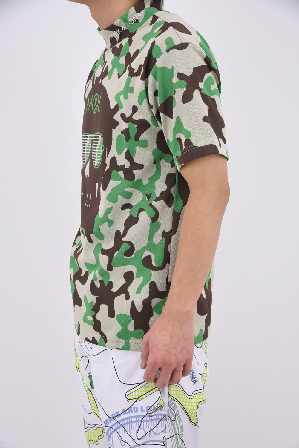 【26SS】 WHAM! SPECTRUM PERFORMANCE MOCK / ジャパンメイド カモフラスカルジャカード スワロフスキー モックネックTシャツ (グリーン)