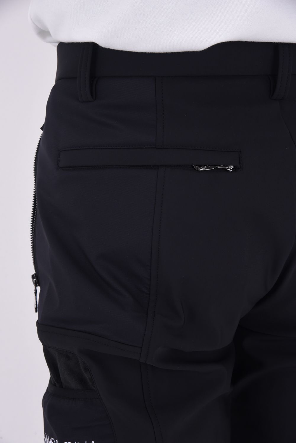 【2025AW】 PRIMAL AIR HYBRID PANTS / PERTEX®ナイロン リフレクタープリント ハイブリッドロングパンツ (ブラック）