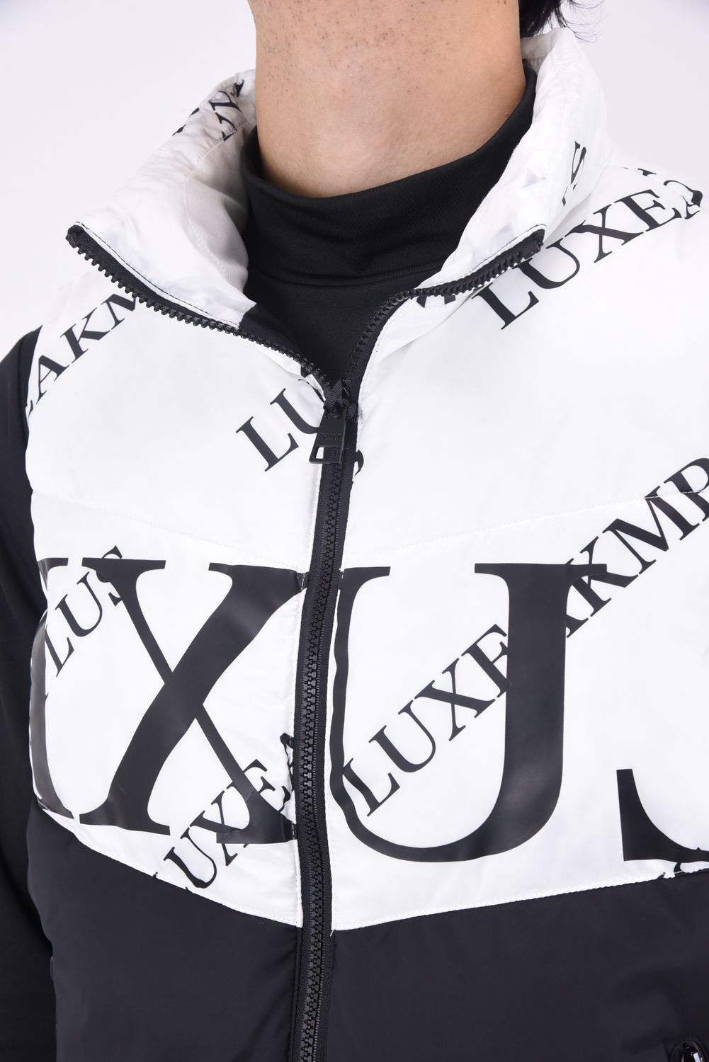 BICOLOR CIRCLE LOGO VEST / バイカラー 総柄 中綿ベスト (ホワイト/ブラック)