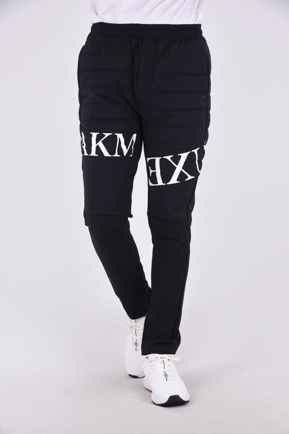 LUXEAKMPLUS - BATTING LOGO PANTS / ロゴ パデッド ドッキングパンツ