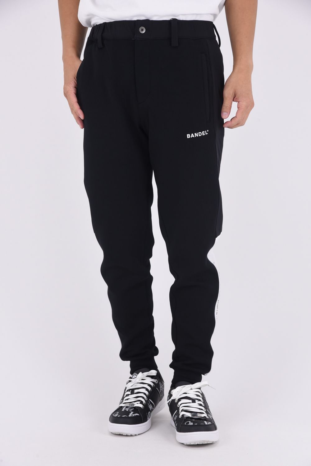 【25AW】 SIDE THICK LINE SWITCH LIB PANTS / ボンディング素材 コンセプトノーツプリント リブロングパンツ (ブラック)