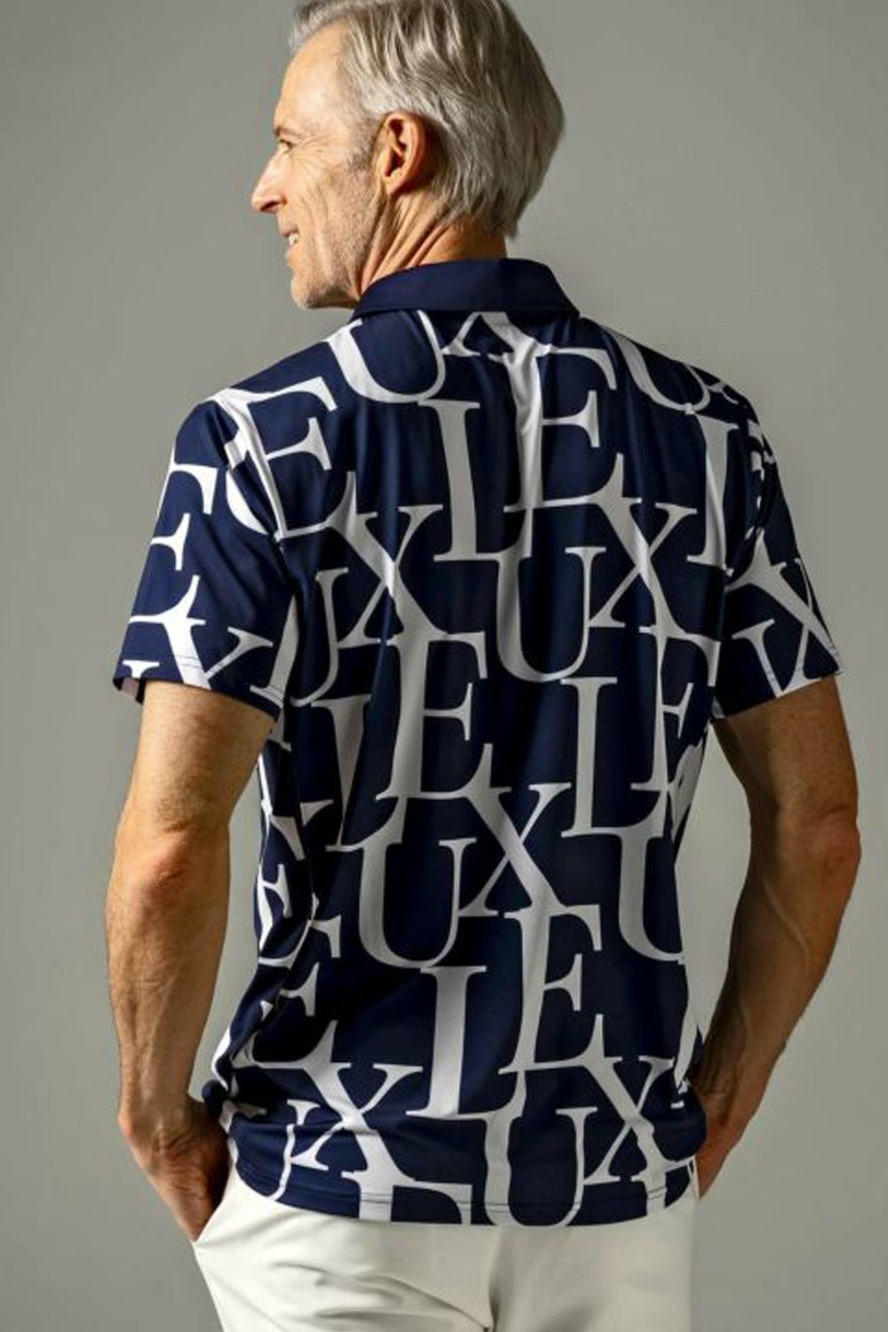 LUXE PATTERN POLO SHIRTS / 総柄ロゴ 半袖ポロシャツ ネイビー