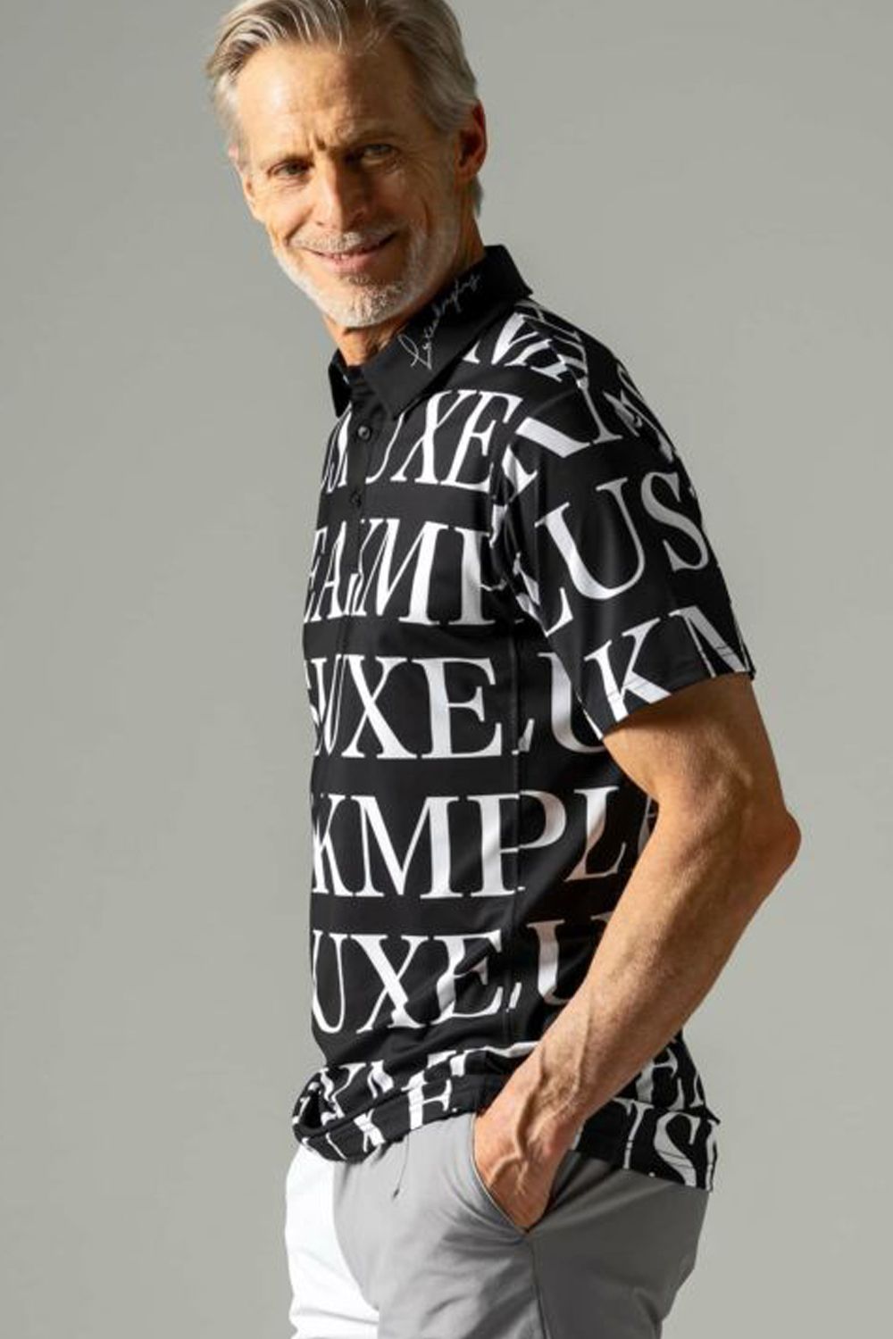 HORIZONTAL PATTERN LOGO POLO SHIRTS / 襟ロゴ 総柄 半袖ポロシャツ (ブラック)