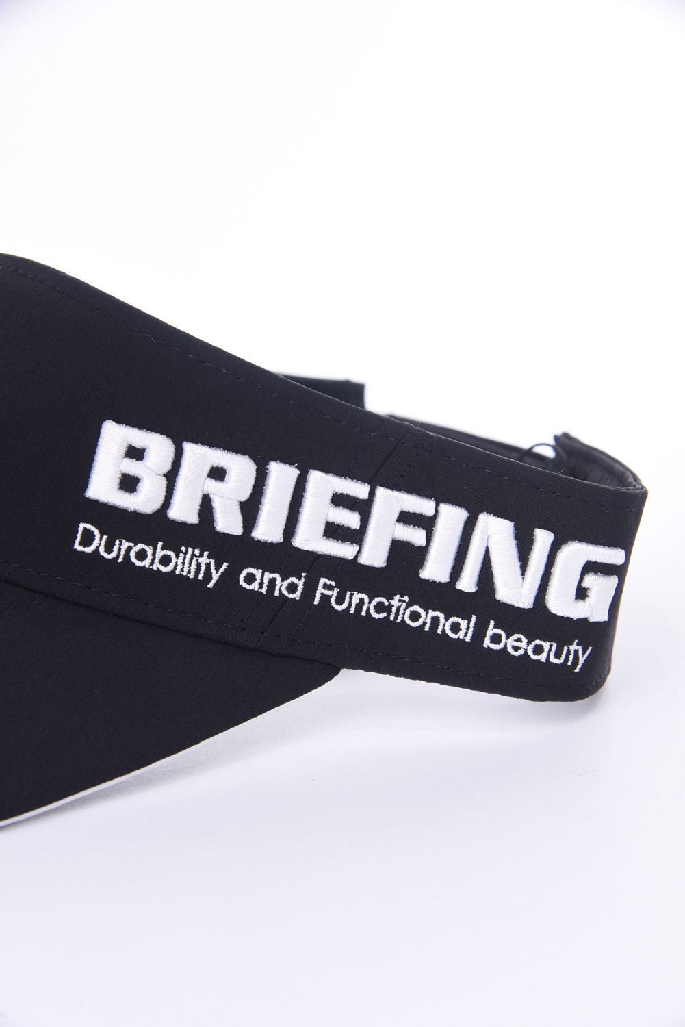 BRIEFING - MENS ROUND LOGO VISOR / ロゴ刺繍 アシンメトリー