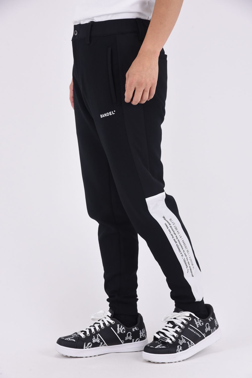 【25AW】 SIDE THICK LINE SWITCH LIB PANTS / ボンディング素材 コンセプトノーツプリント リブロングパンツ (ブラック)