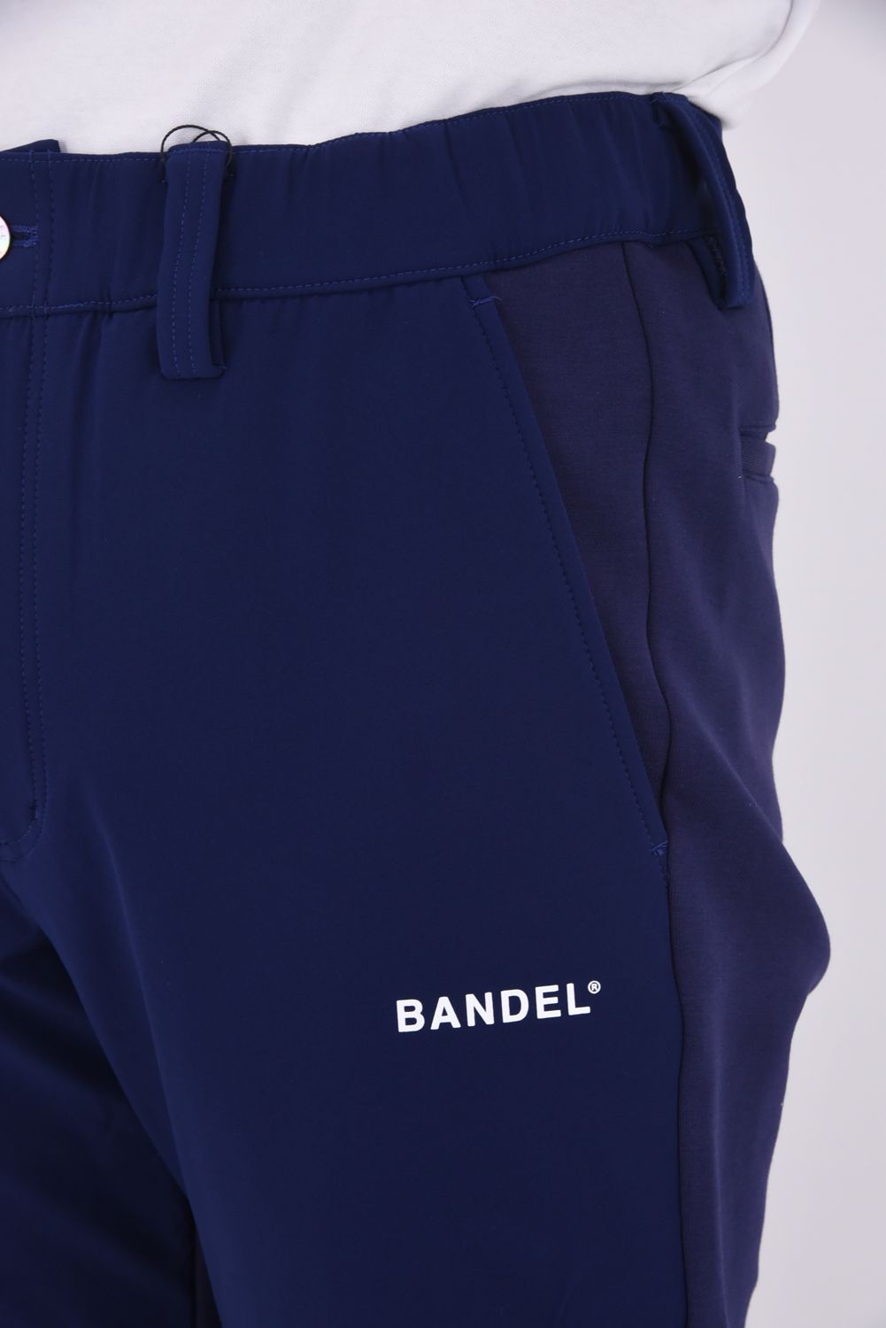 【25AW】 FRONT SWITCH TAPERED PANTS / ボンディング素材 ハイブリッドロングパンツ (ネイビー)