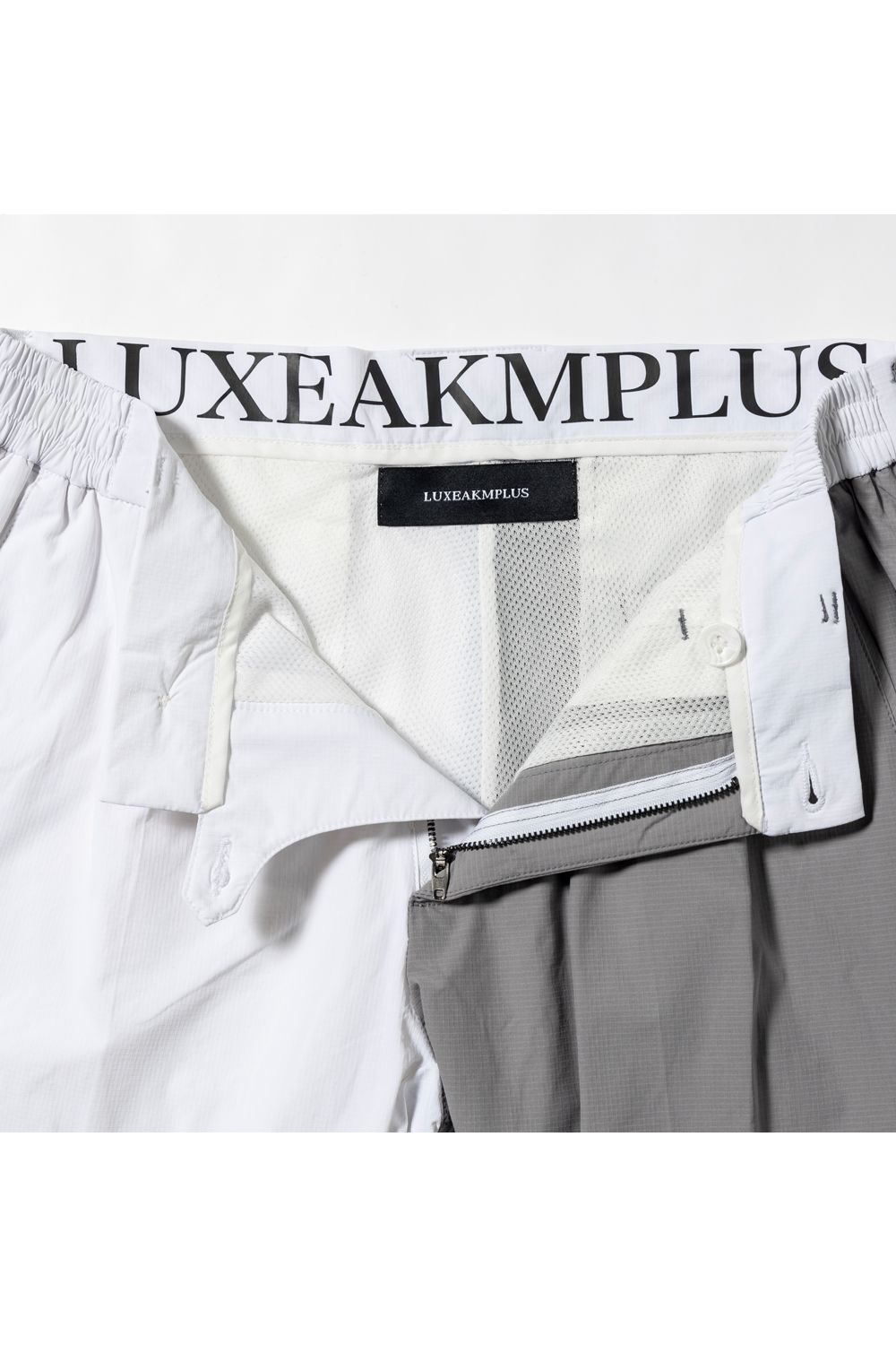 BICOLOR LONG PANTS / バイカラー ナイロンストレッチ スリムフィット ロングパンツ ホワイト