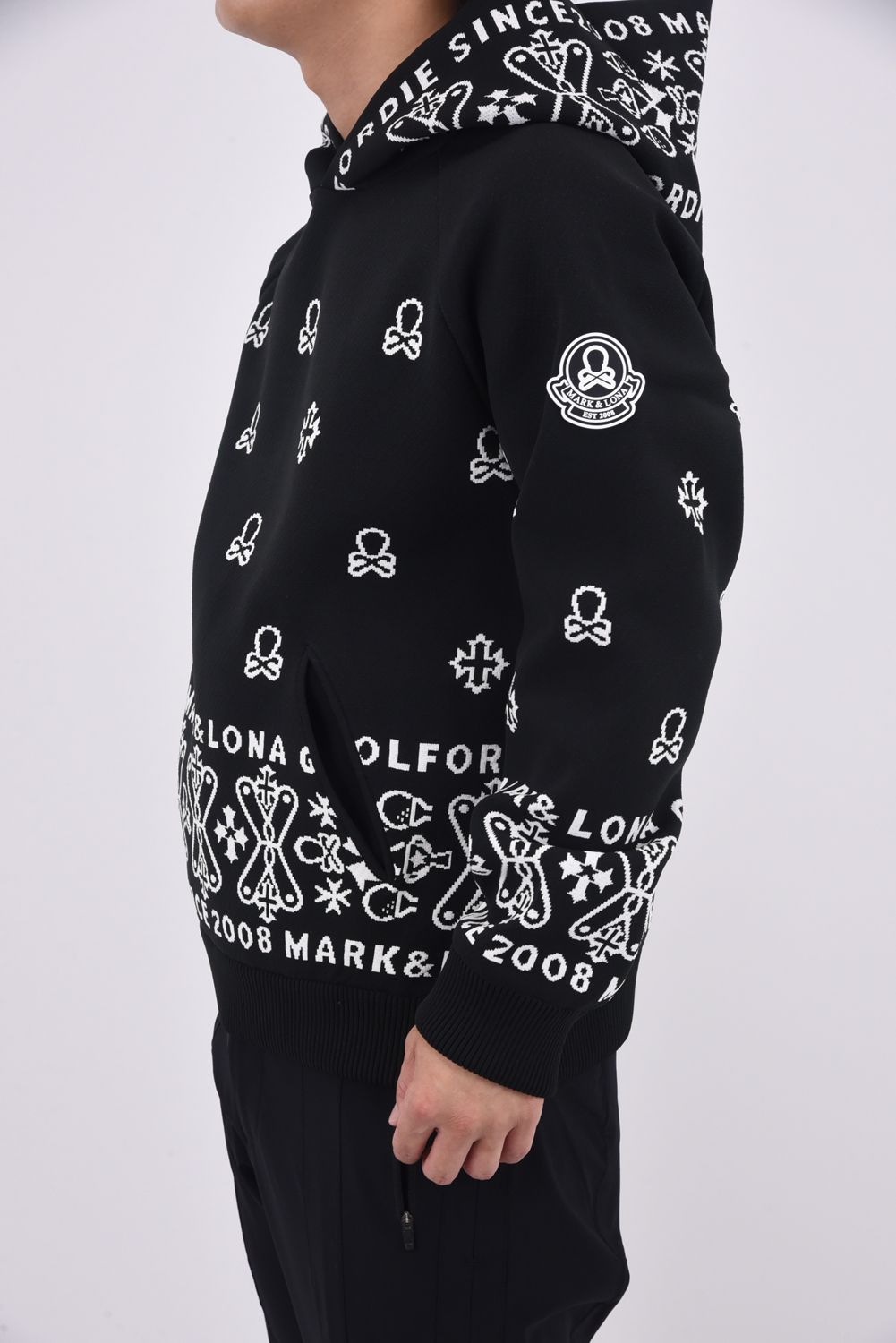 【2025AW】 SVASTIKA POLY FLEX HOODIE / クロスモチーフ オリジナルジャカード ニットフーディー (ブラック)