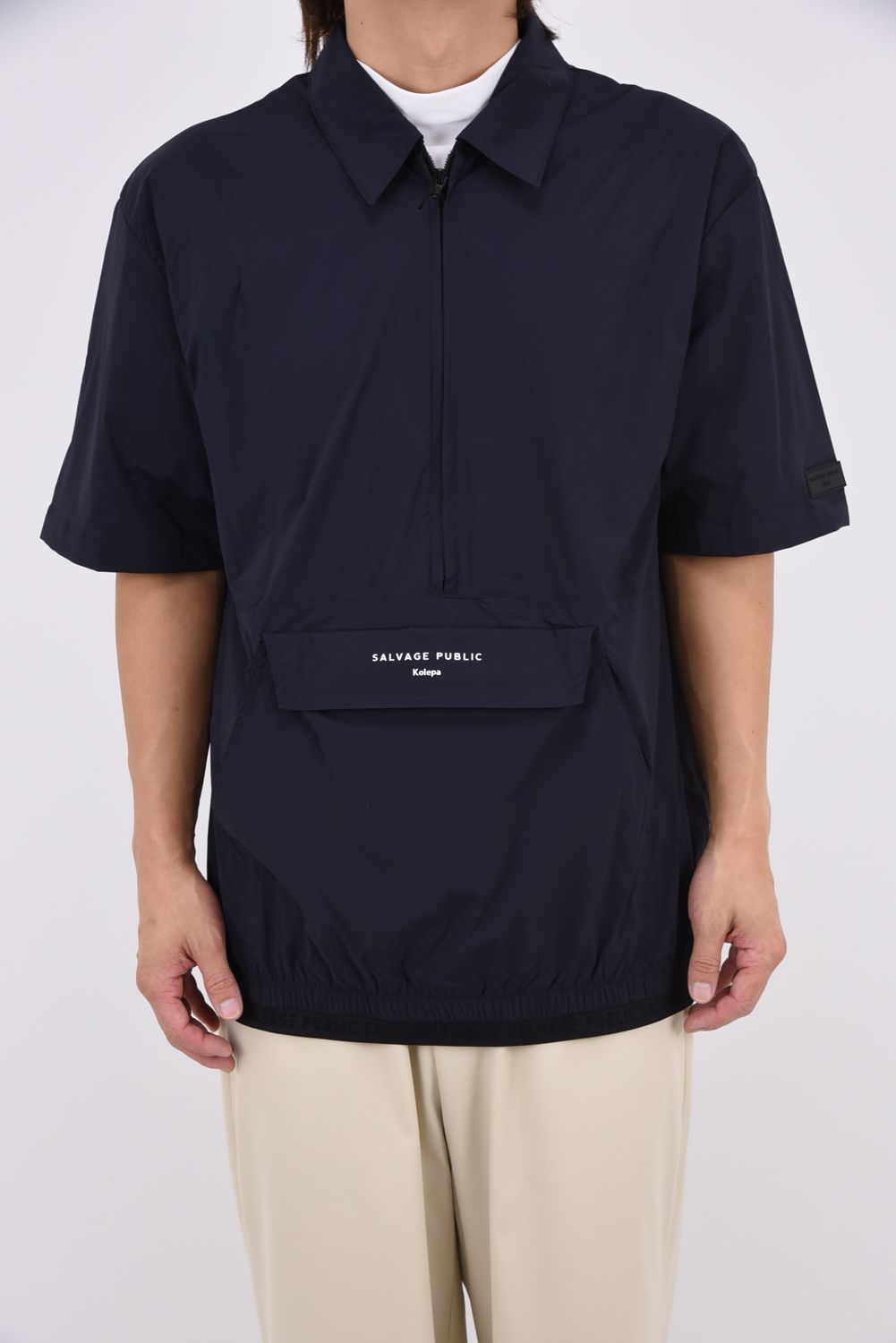 【26AW】 Huli Half-Zip Jacket / ハーフジップ カンガルーポケット 2WAYパッカブルジャケット (ブラック)
