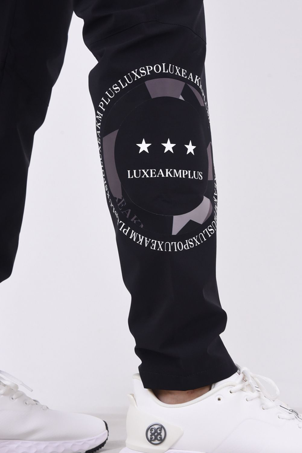 LUXEAKMPLUS - CIRCLE LOGO LONG PANTS / ロゴ ナイロンストレッチ