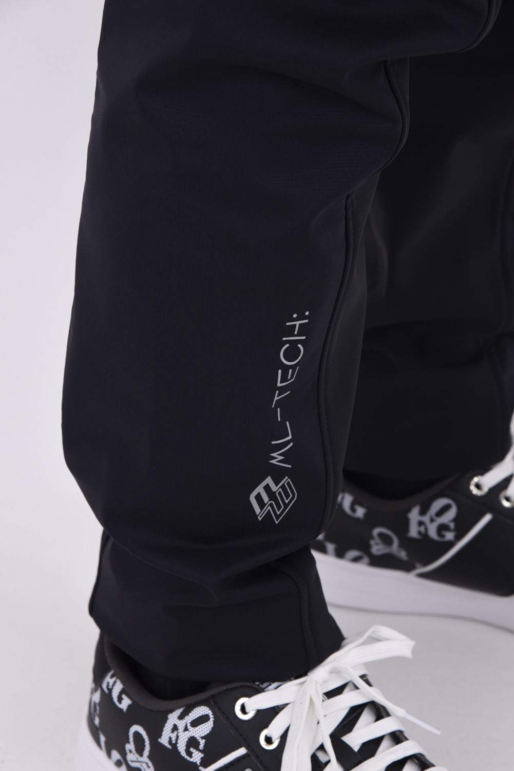 【2025AW】 PRIMAL AIR HYBRID PANTS / PERTEX®ナイロン リフレクタープリント ハイブリッドロングパンツ (ブラック）
