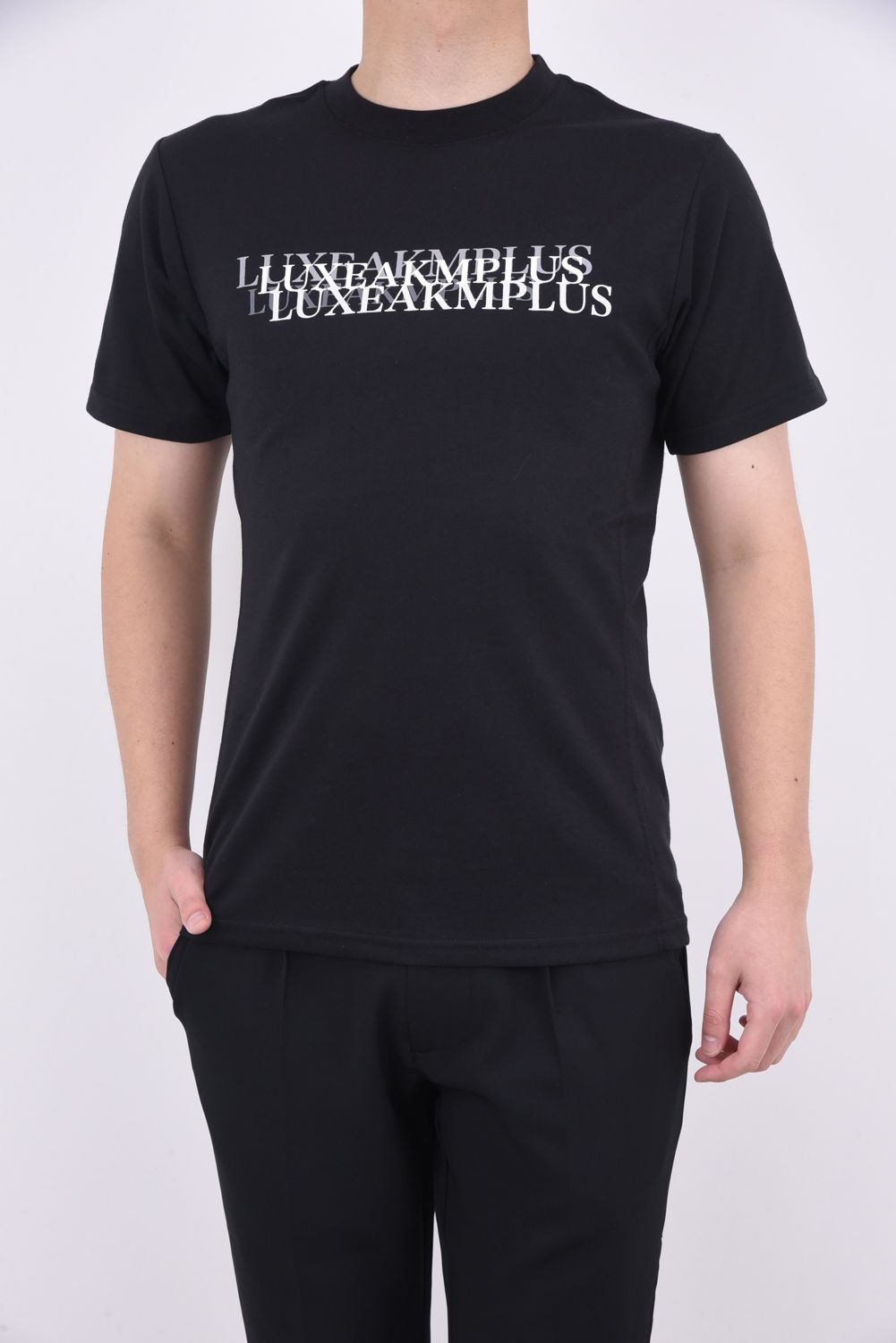 CONTINUOUS PATTERN T-SHIRTS / コンティニュアス ロゴ 半袖Tシャツ ブラック
