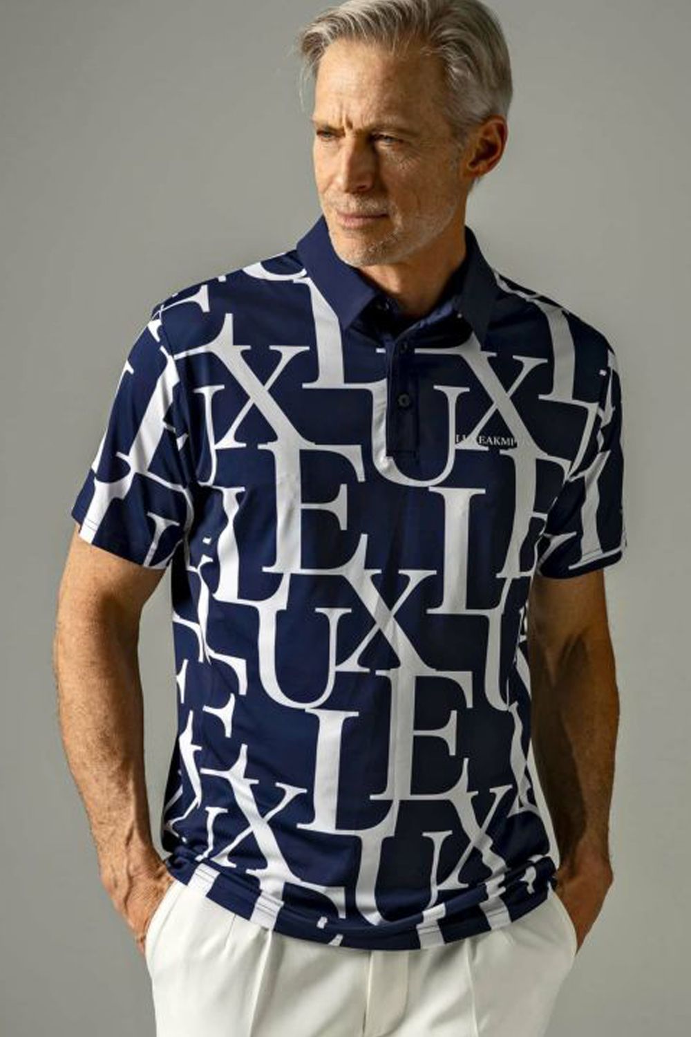 LUXE PATTERN POLO SHIRTS / 総柄ロゴ 半袖ポロシャツ ネイビー