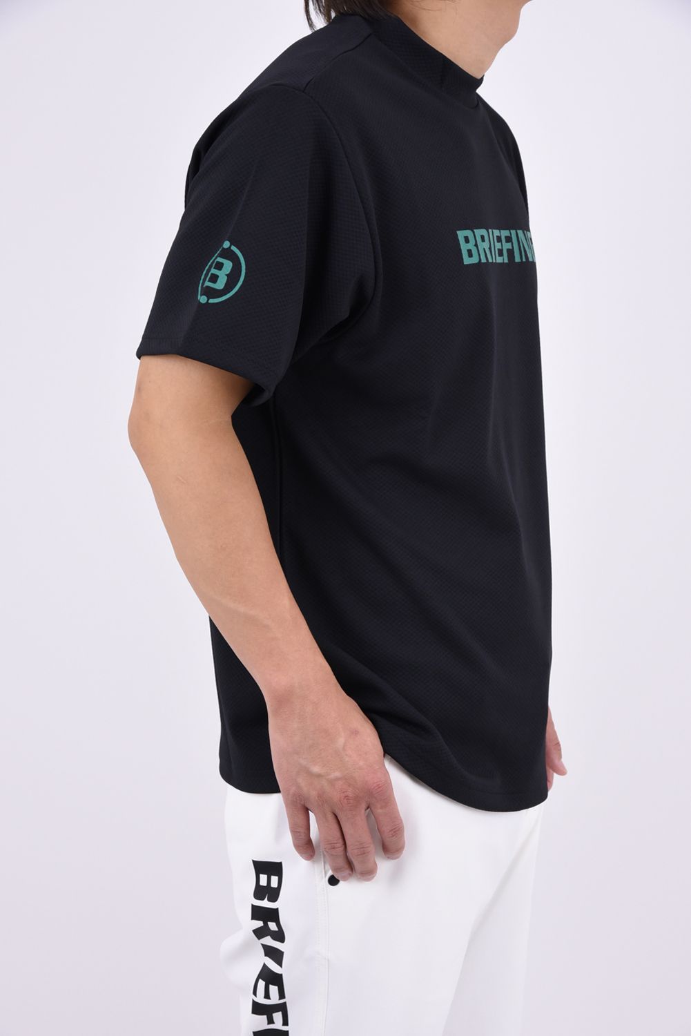 【26AW】 MEN’S EARTH PIQUE HIGHNECK / ハニカムメッシュ ロゴプリント モックネックTシャツ (ブラック)