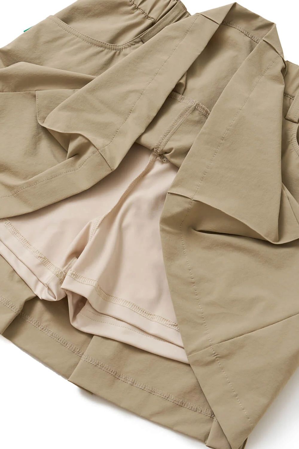 【26SS】【レディース】 OZ SKIRT / ストレッチナイロン バックロゴライン スカート (インナーパンツ一体型) (ベージュ)