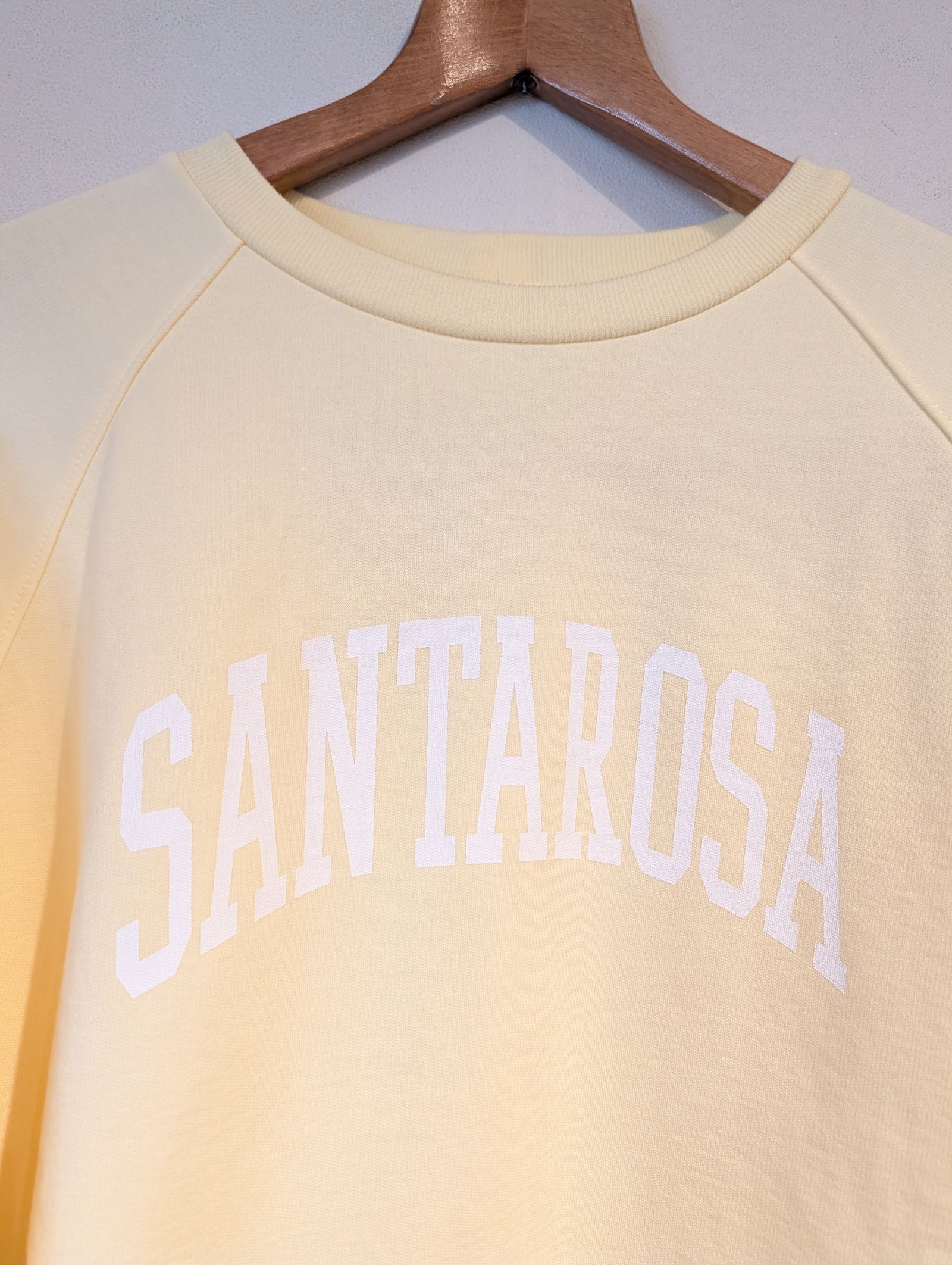"SANTAROSA"ラグランスリーブロゴスウェット / ロゴスウェット / イエロー