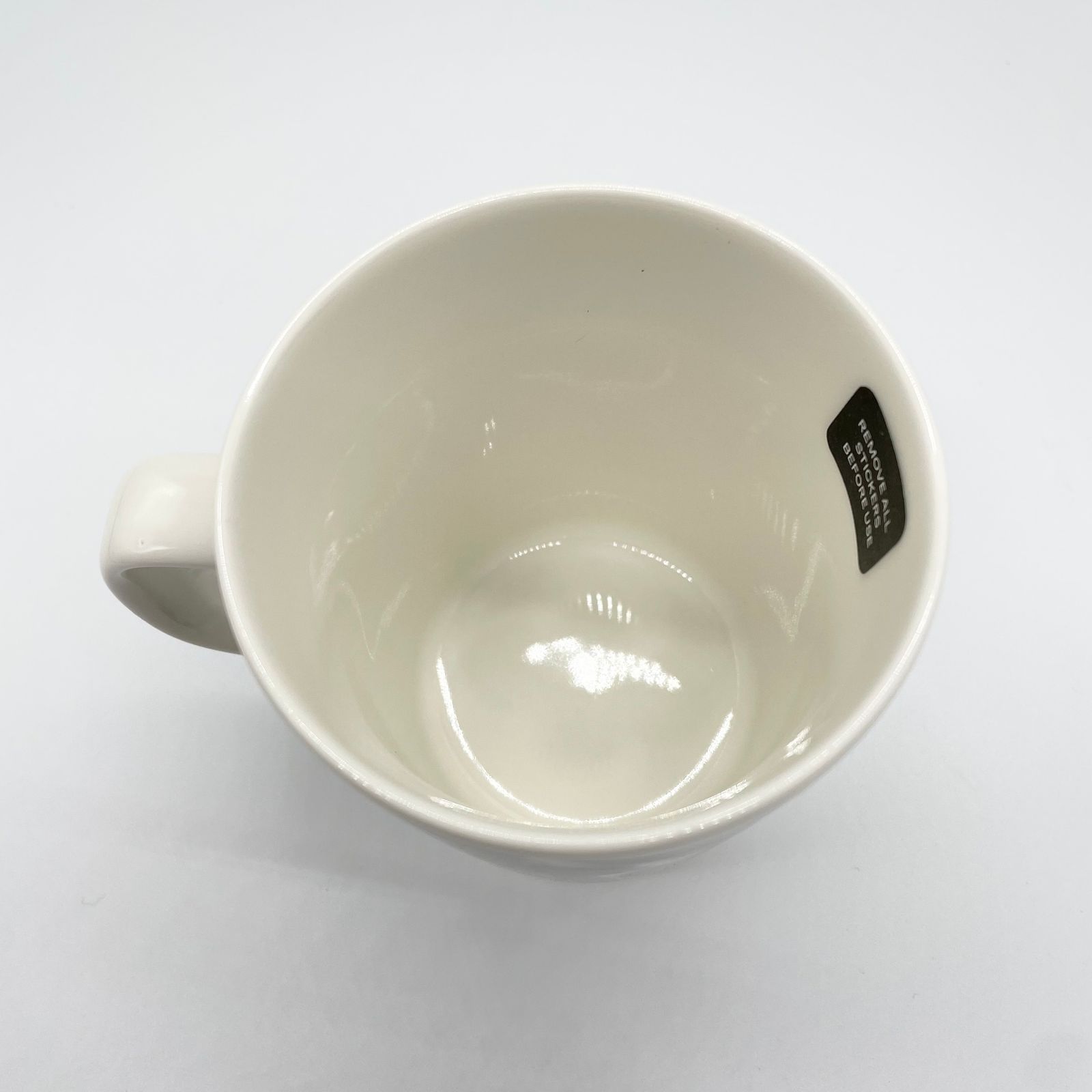 Karhuemo マグカップ
