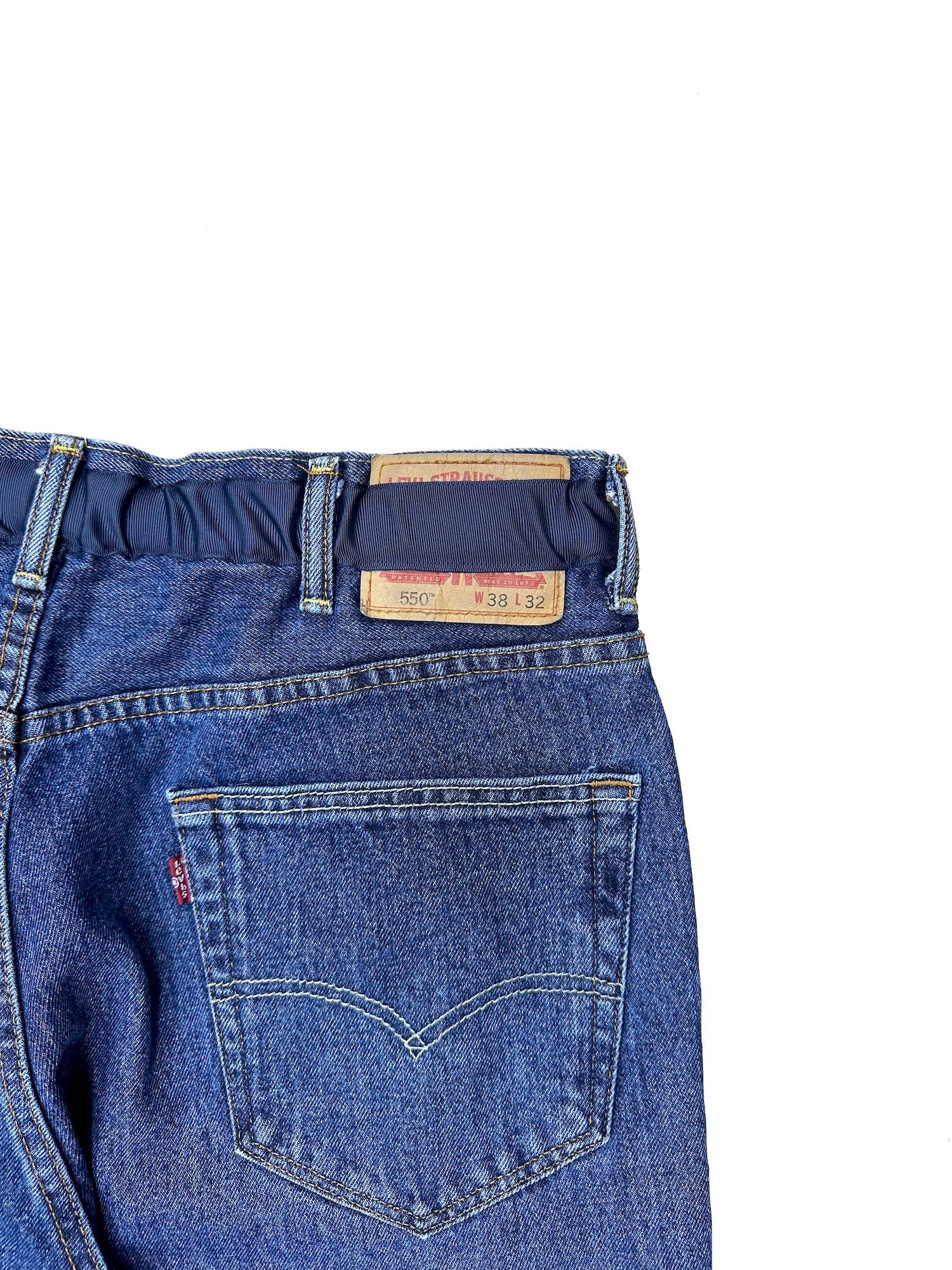 THE DEFORMED ADJUSTABLE THRIFTING DENIM 550 [FIGURE PROTO] / リメイク デニムパンツ（INDIGO）