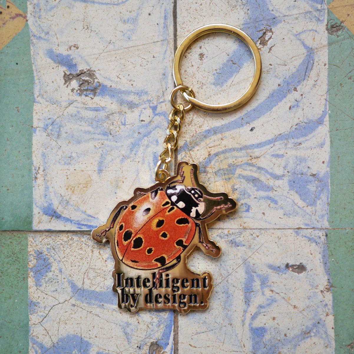 INTELLIGENT BY DESIGN KEYCHAIN/ キーチェーン