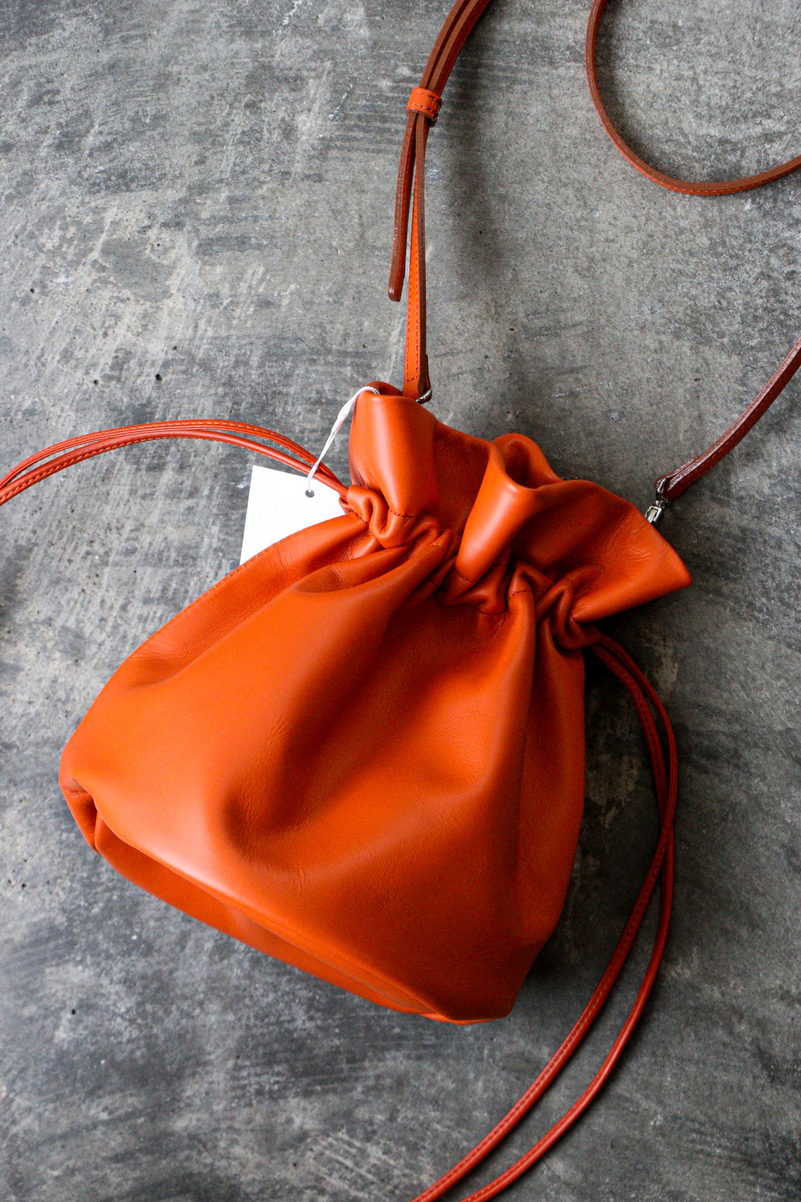 Rich I - CYLINDER LEATER PURSE BAG ORANGE / スモール / 巾着バッグ 