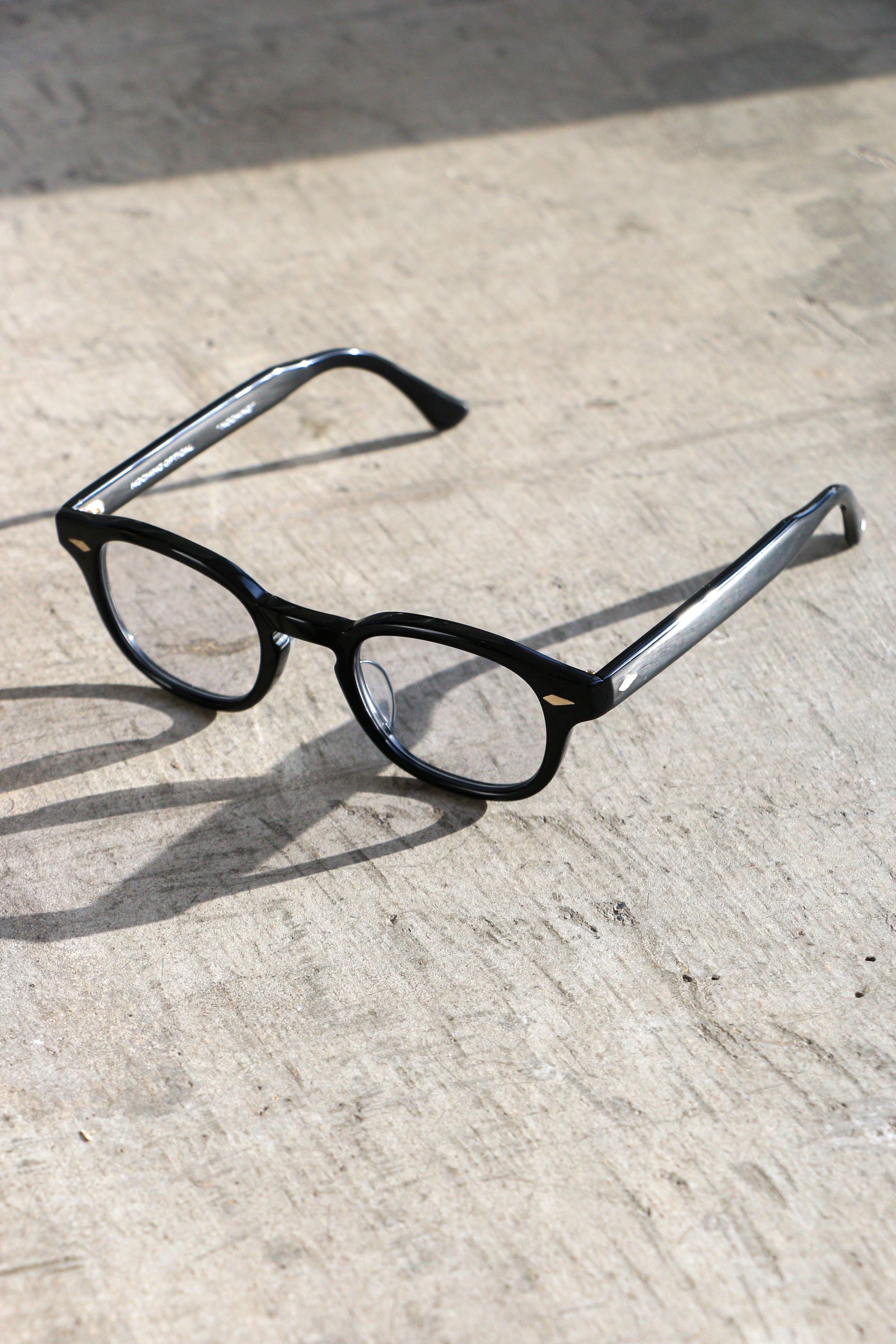 NOCHINO OPTICAL GLOSSBLACK×CLEAR to GREY | gualterhelicopteros.com.br